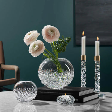Orrefors Crystal featuring Carat Collection Globe Vase, Candlesticks, and Votive Holder