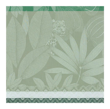 Green and white patterned fabric with leaf design