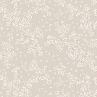 A tablecloth with a floral pattern in shades of cream and grey, displayed on a set table with dishes and decorative items.