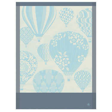 A blue kitchen towel with a pattern of decorated hot-air balloons and floral designs on a light blue background.