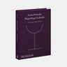 Book titled 'Regarding Cocktails' by Sasha Petraske with a white line drawing of a cocktail glass on a purple background.