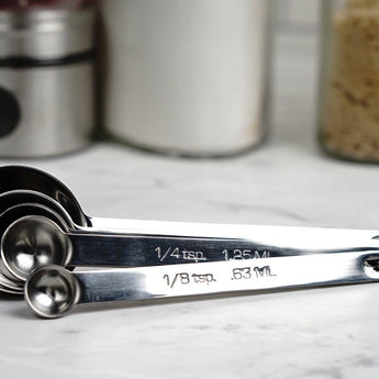 Etched stainless steel measuring spoons