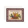 Rifle Paper Co. Vintage thanksgiving card featuring a basket with fruits and vegetables. Brown floral border
