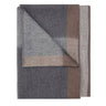 Folded fabric with gray and brown pattern on a white background