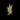 A single metallic gold fern leaf pendant or brooch centered on a solid black background.