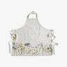 White apron with floral design on a white background