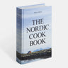 Cookbook titled, “ The Nordic Cook Book” by Magnus Nilsson. Cover features an image of Nordic landscape by the water’s edge. 