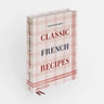 Book titled “Classic French Recipes” by 
Ginette Mathiot. Red and white plaid background. 
