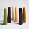 Several colors of Greentree’s Petite Pillar candles