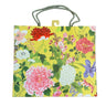 Caspari ‘A Profusion of Flowers’ yellow large gift bag with celadon green rope handles