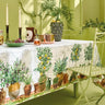 white tablecloth with potted plants trees olive lemon